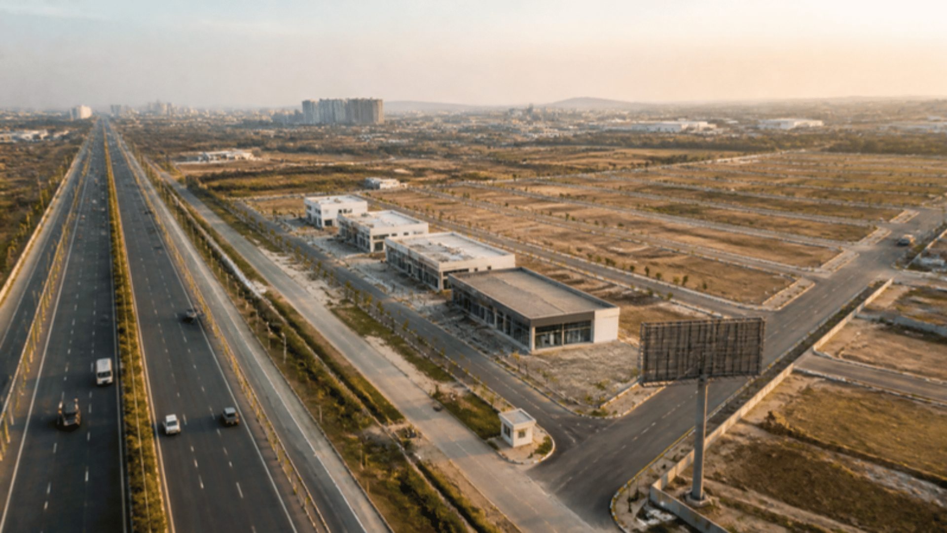 Plotted commercial layout along a Hyderabad highway promoted through commercial project marketing