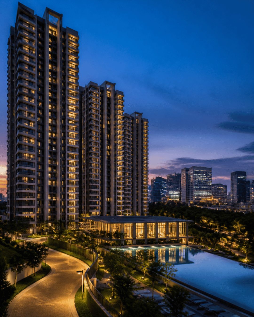 High-rise gated community marketing in Hyderabad: residential towers at dusk in the Financial District